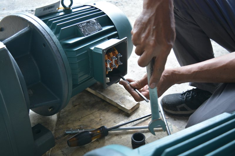 Technician working on an electric motor